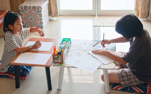 Woman working on table