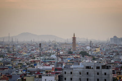 High angle view of townscape against sky during sunset