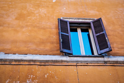 Low angle view of windows on building