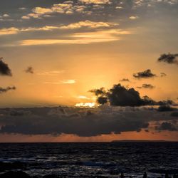 Scenic view of sea against dramatic sky