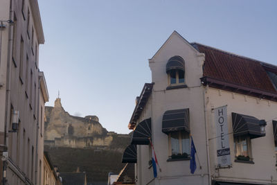 Low angle view of buildings against clear sky