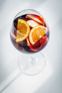 High angle view of fruits in glass on table