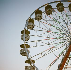 Low angle view of ferris wheel against sky