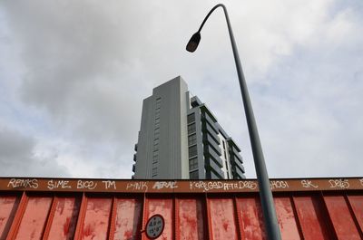 Low angle view of skyscraper against sky