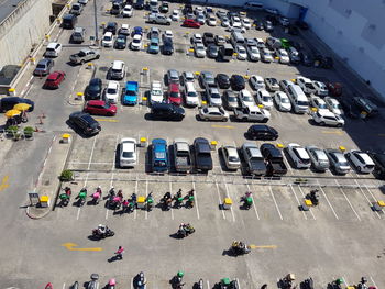 High angle view of vehicles on road in city