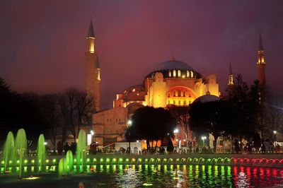 Low angle view of illuminated fountain at night