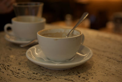 Close-up of coffee cup on table