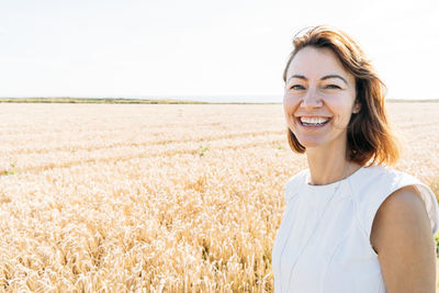 Summer concept, caucasian middle-aged woman in the countryside