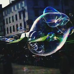 Close-up of bubbles against blurred background