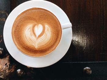 High angle view of cappuccino on table