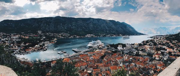 High angle view of city by sea