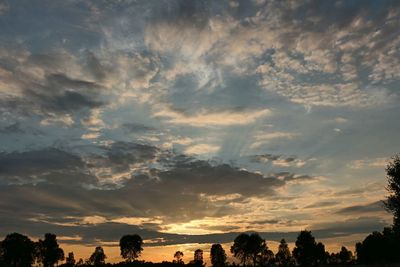 Scenic view of landscape against cloudy sky