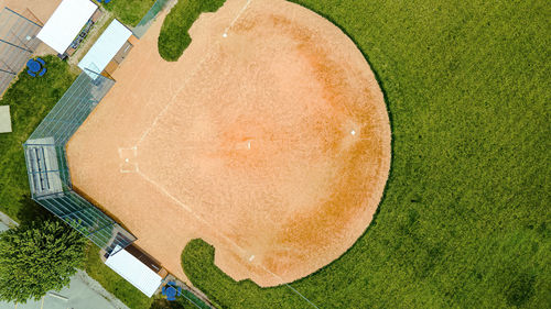 Fresh grass grows in the spring around the baseball fields at a local park.