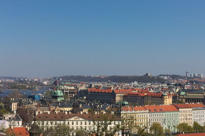 High angle view of townscape against blue sky