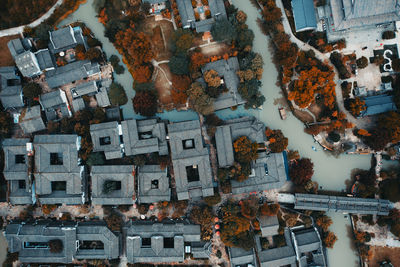 High angle view of illuminated street and buildings in city