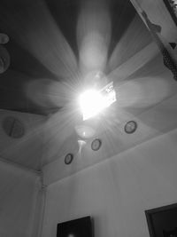 Low angle view of illuminated ceiling