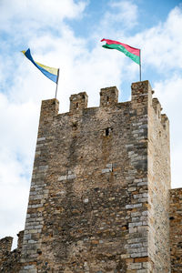 Low angle view of flag on building