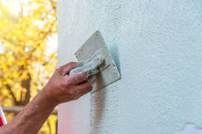 Application of facade plaster outdoor.