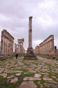 Historic temple against sky in city