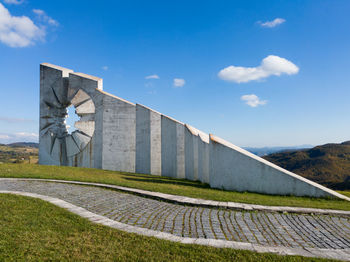 Low angle view of built structure against blue sky