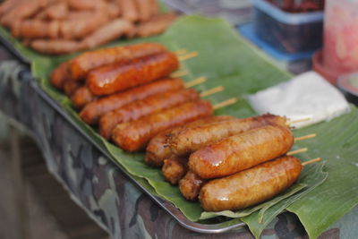 Close-up of meat on barbecue grill