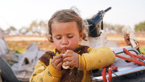 Close-up of boy eating food