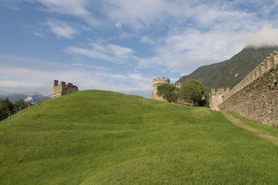 View of the medieval castle walls of the world unesco heritage site in bellinzona, switzerland