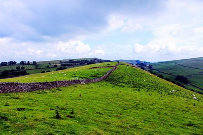 Scenic view of land against sky