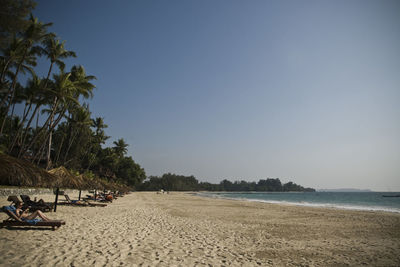 Scenic view of beach against clear sky