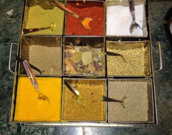 High angle view of spices in glass container