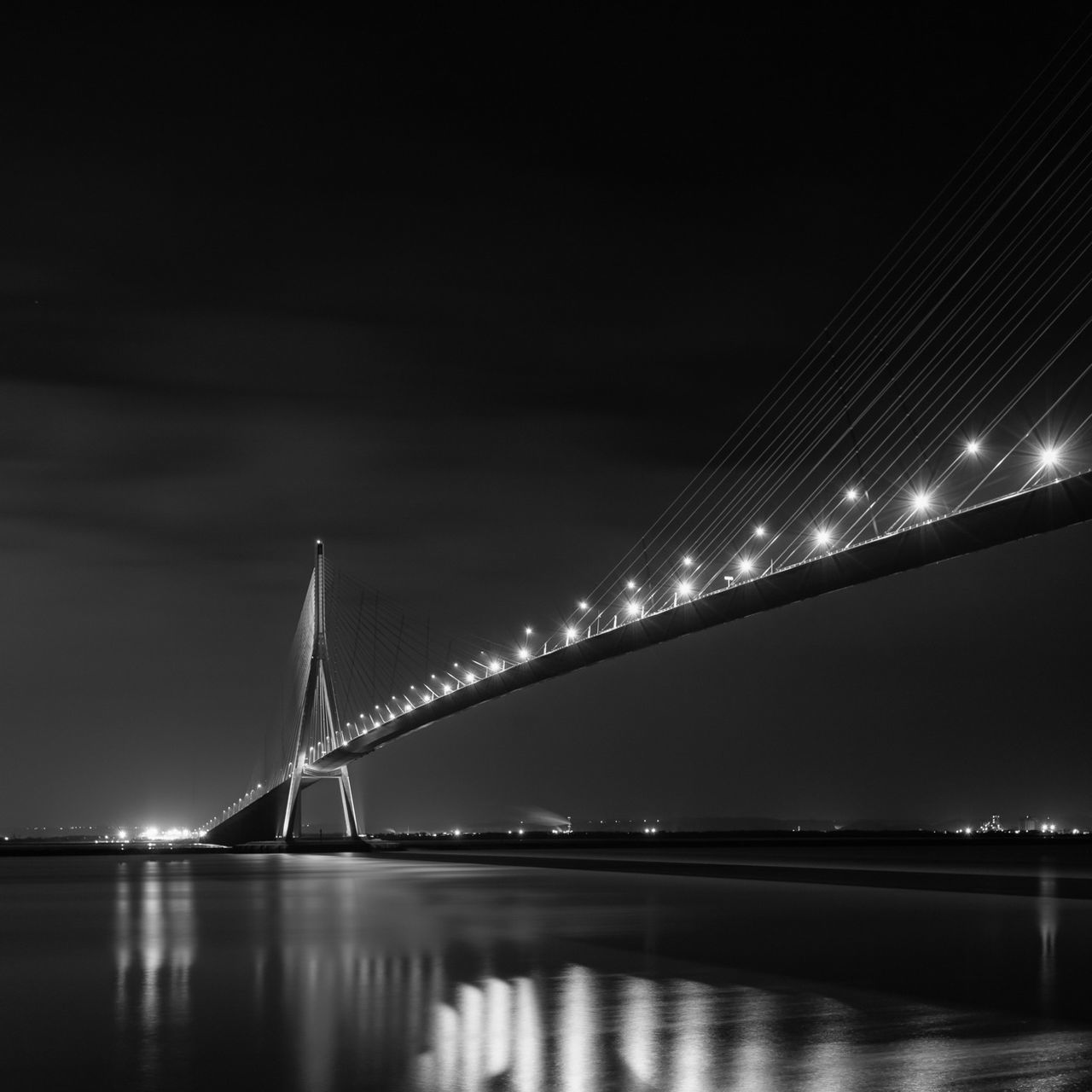 architecture, built structure, night, illuminated, water, bridge - man made structure, connection, suspension bridge, engineering, travel destinations, famous place, international landmark, waterfront, river, city, travel, tourism, sky, capital cities, transportation