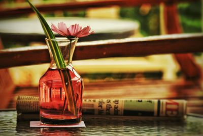 Close-up of drink in glass jar on table