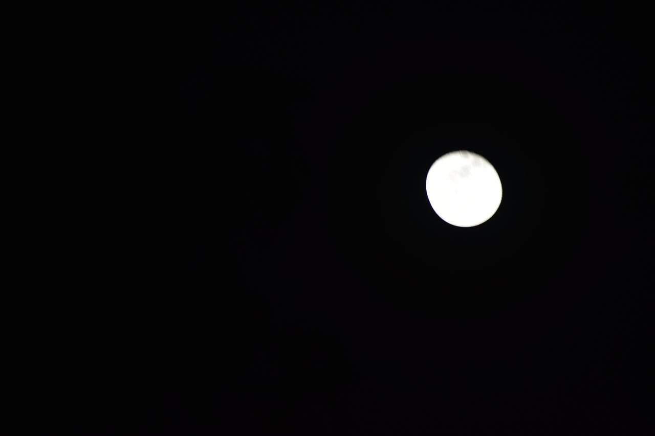 moon, sky, space, night, copy space, astronomy, full moon, beauty in nature, no people, circle, scenics - nature, tranquility, geometric shape, low angle view, tranquil scene, dark, celestial event, shape, nature, planetary moon, black and white, astronomical object, clear sky, idyllic, outdoors, moonlight, darkness