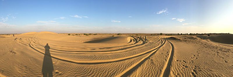 Scenic view of desert against sky