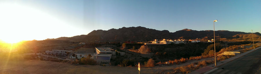 Sun shining over landscape