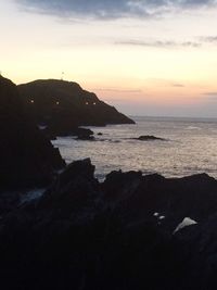 Scenic view of sea at sunset