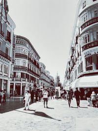 People walking on city street