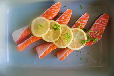 Close-up of uncooked seafood in container