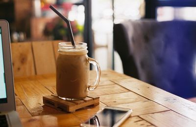 Close-up of coffee cup on table