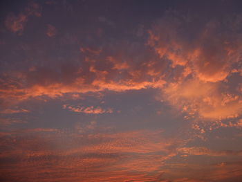 Low angle view of dramatic sky during sunset