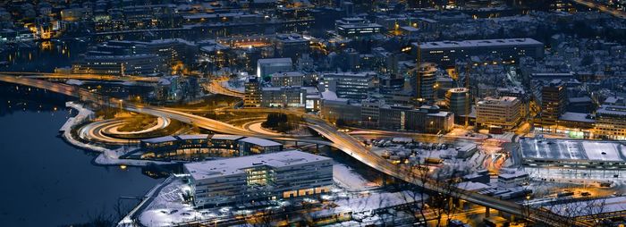 High angle view of illuminated cityscape at night