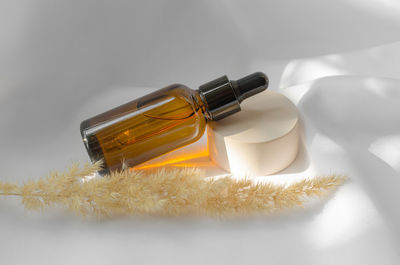 Essential oil or serum in a brown bottle with a dropper. beauty cosmetics, body care.