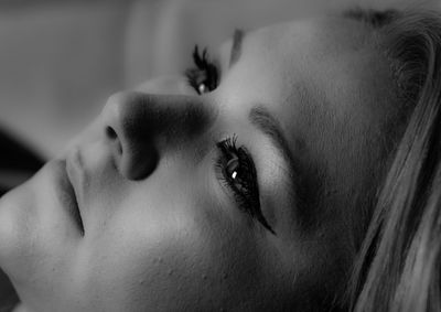 Close-up of thoughtful woman looking away