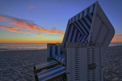 Scenic view of sea against sky at sunset
