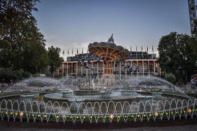 Tivoli gardens amusement park in central copenhagen offers rides, games, musicals, major concerts.