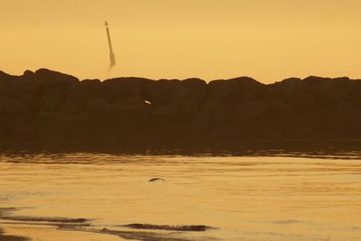 Scenic view of sea at sunset
