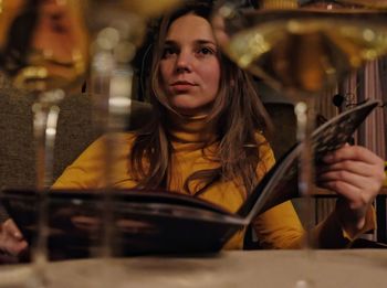 Woman sitting in restaurant