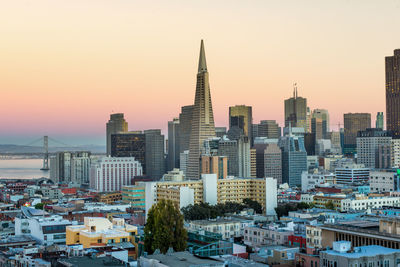 View of buildings against sky during sunset