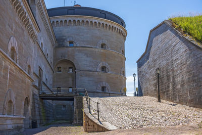 Old fortress with a tower at the moat