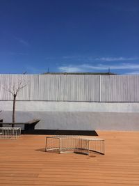 Metallic structure against blue sky